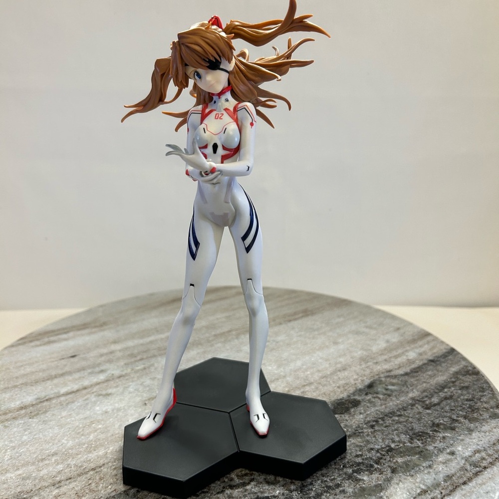 Anime Figure with White and Red Suit